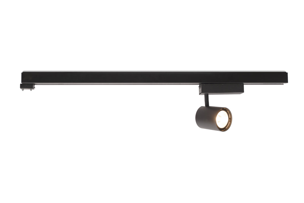 Black track light fixture with a spotlight on a white background